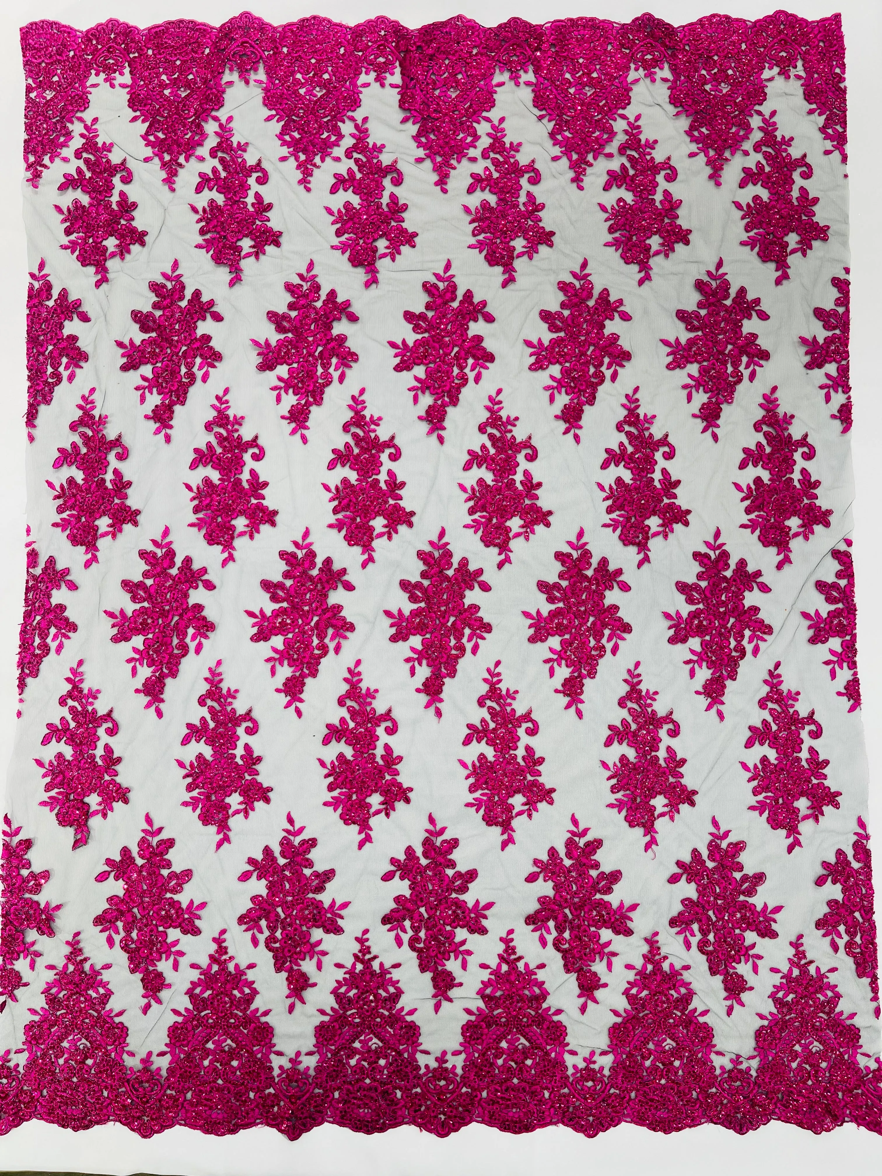 Fuchsia Metallic corded embroider with sequins on a Black mesh lace fabric-prom-sold by the yard.