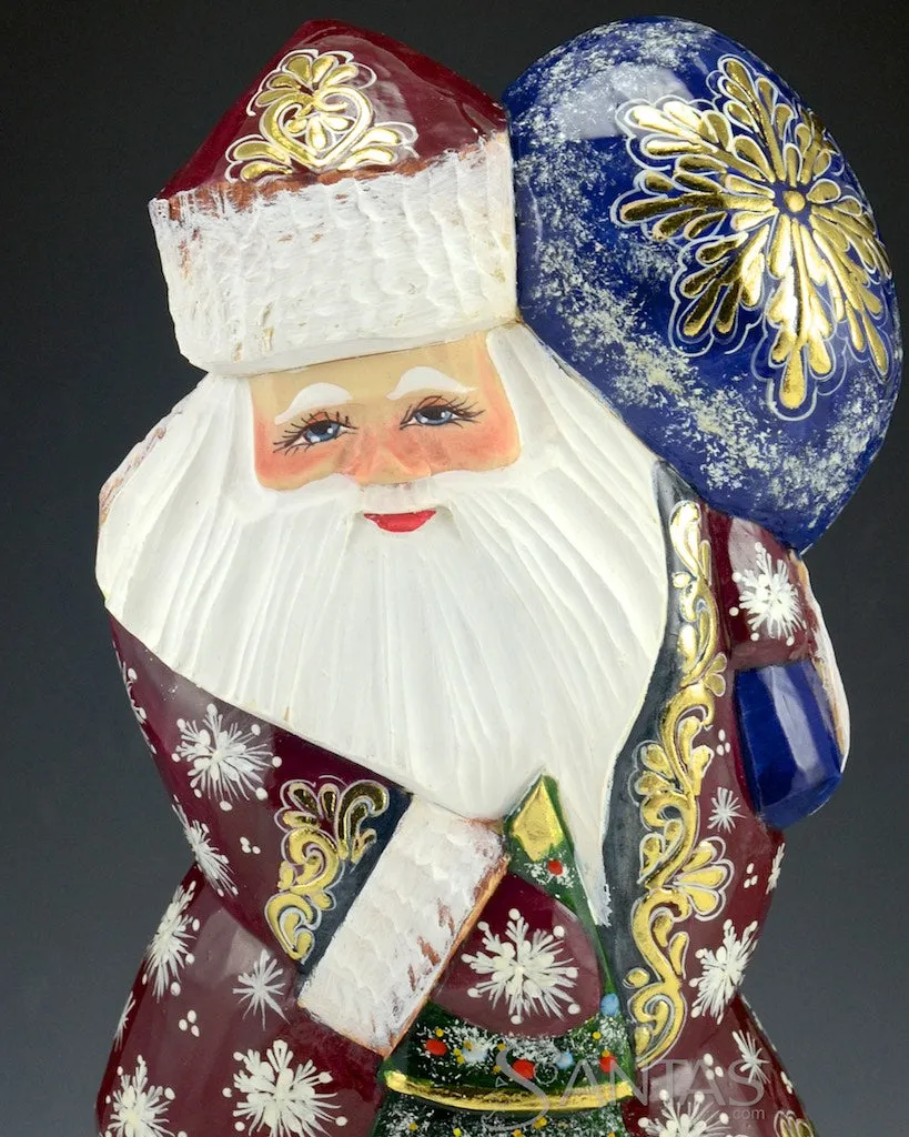 Shiny Red Russian Santa with Toy Bag and Tree sitting on Stump 10 inch